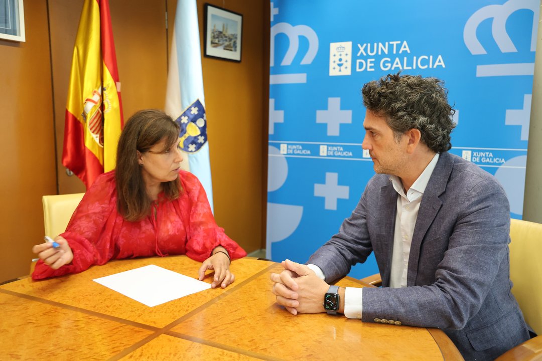 Reunión Mariña Gueimunde e Javier Arias