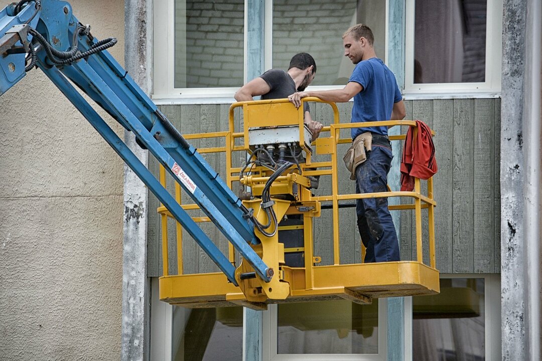 Obras, fachada, obreros